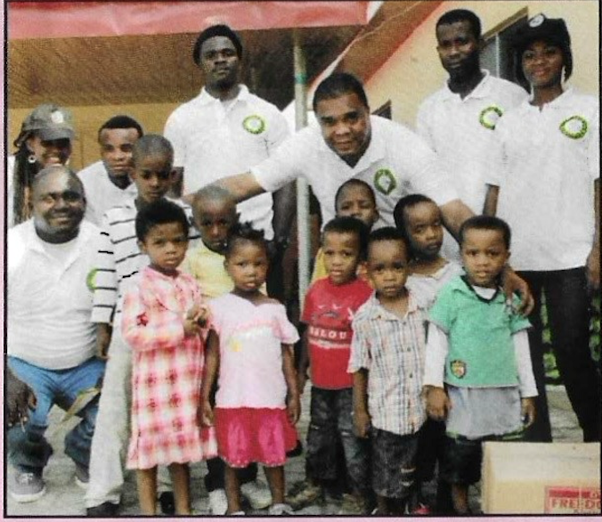 KUTH volunteers with children of the home