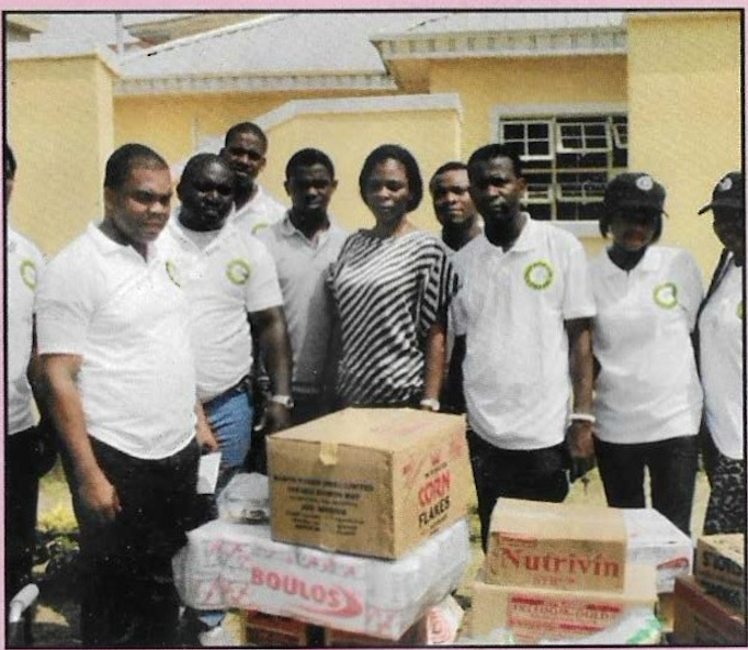 Children and caregivers receiving provisions during the visit