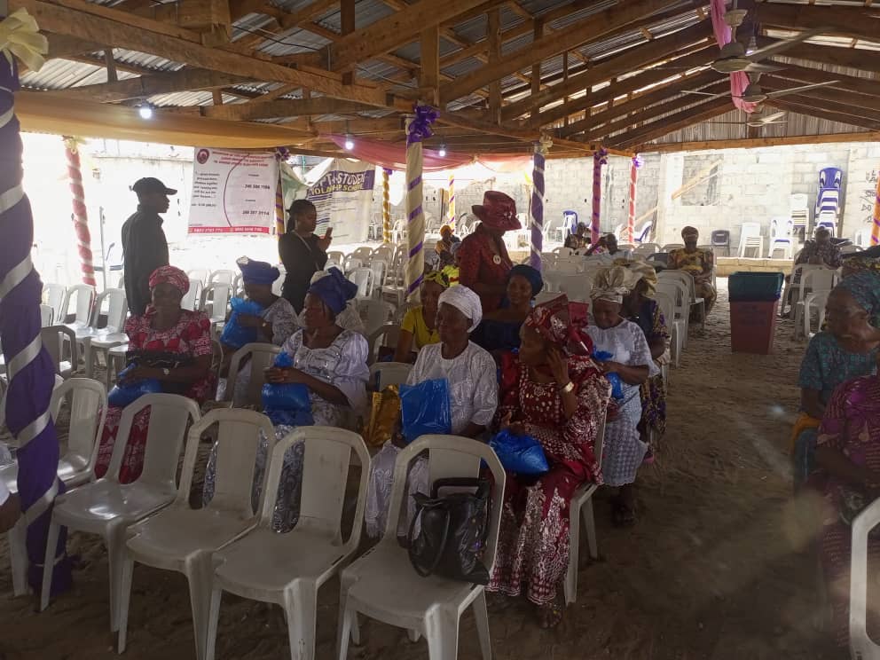 Wide shot of the venue with widows seated