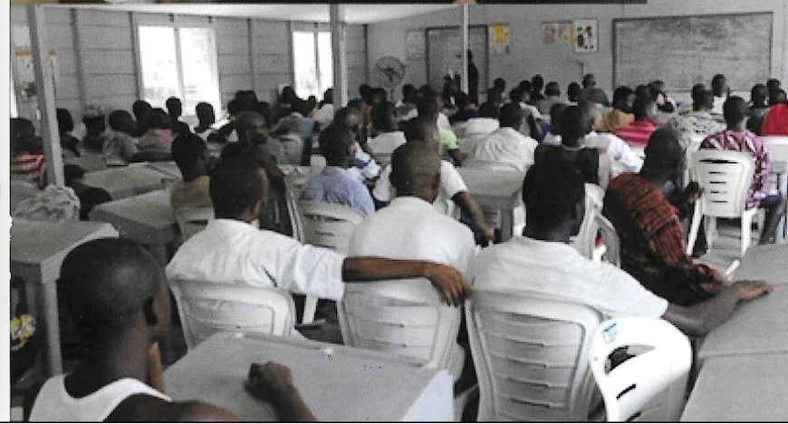 Inmates gathered for a KUTH Foundation outreach session in a Lagos prison hall, 2012