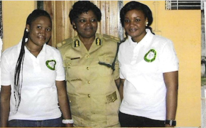 KUTH Foundation team members with a Nigerian Prisons Service officer, 2012 prison outreach