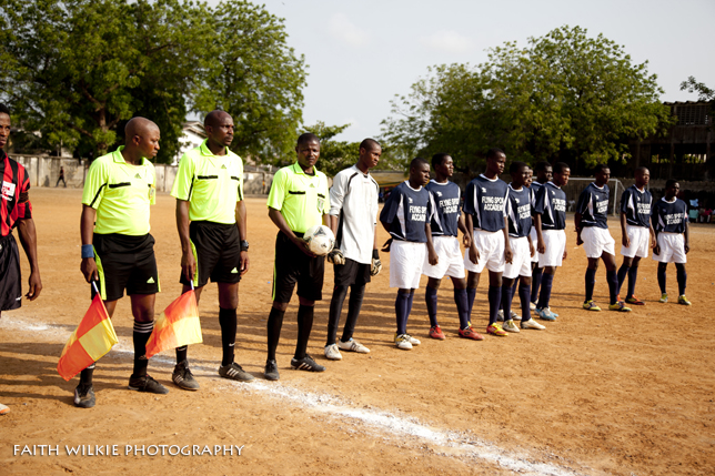 Referees and team lineup with officials