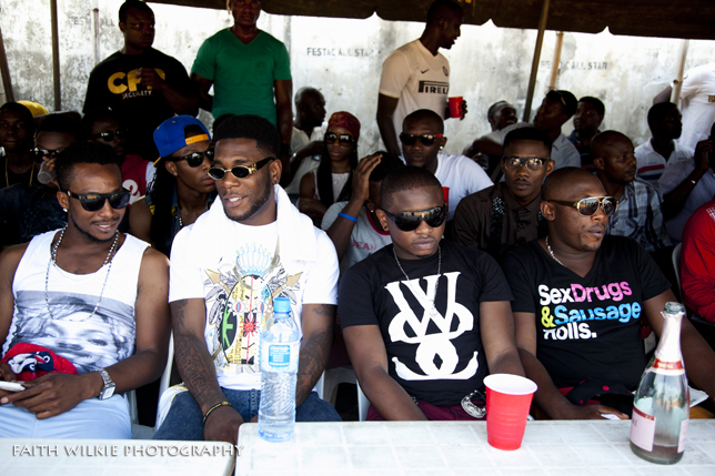 Celebrities including Burna Boy watching the match