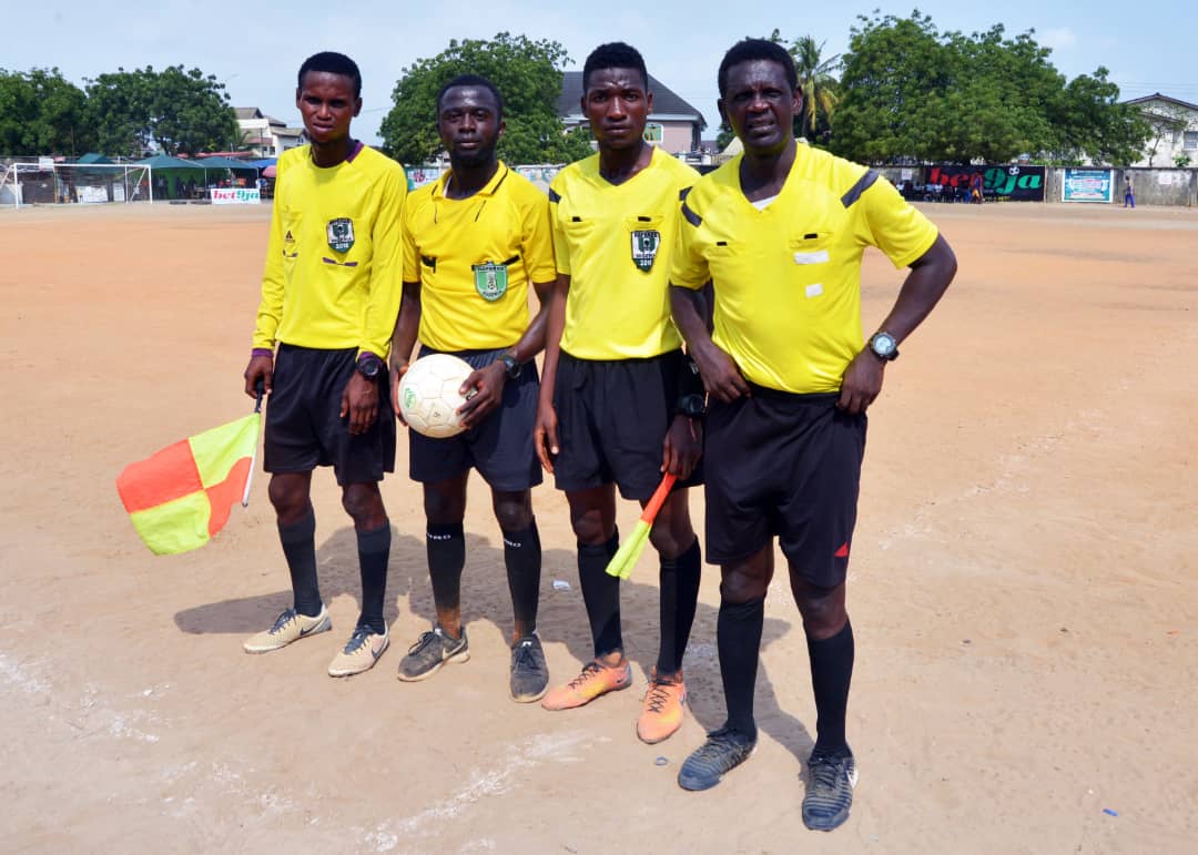 Match officials in yellow