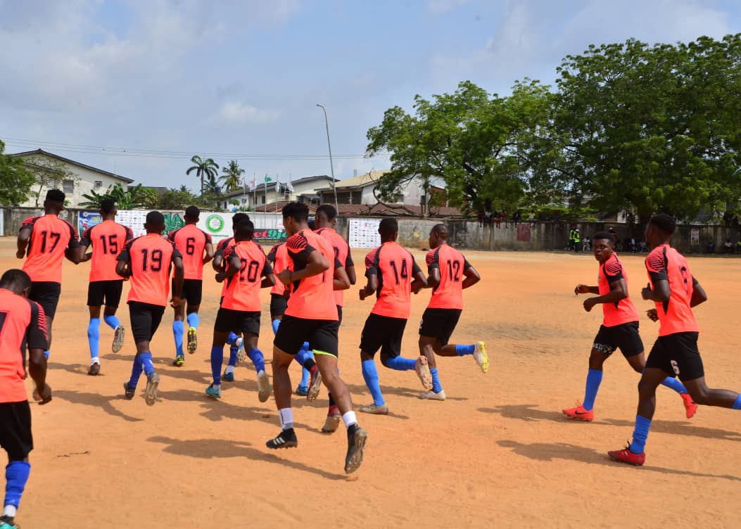 Team warming up on the pitch
