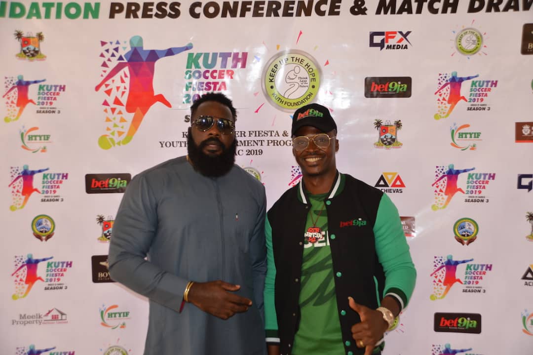 Founder with BET9JA representative at the event
